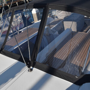 The dodger provides protection from the elements, and the oversized windows make for superior visibility. Compass Canvas Beneteau 51 Dodgers Projects