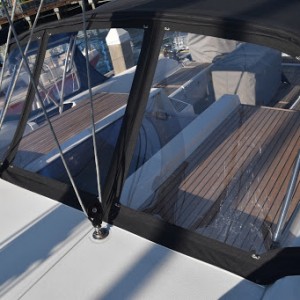 The dodger provides protection from the elements, and the oversized windows make for superior visibility. Compass Canvas Beneteau 51 Dodgers Projects