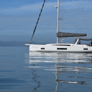 This beauty got decked out with a new matching bimini, stackpack, and dodger. It added a very sleek aesthetic. Beneteau Oceanis 46 Bimini