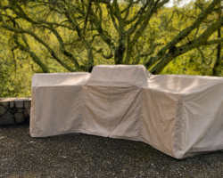 When you have a custom outdoor kitchen you need a custom outdoor kitchen cover. Shown in Sunbrella