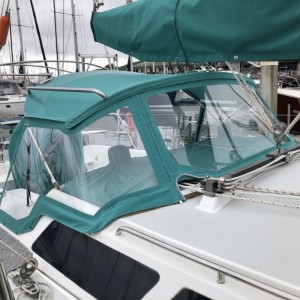 We work with our customers to make the best design for a durable dodger that meets your needs. Compass Canvas Dodger with Tracks and Zips Projects