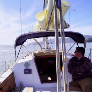 Compass Canvas Owner, Nick, relaxing under the custom dodger he made for his Ericson 35. Compass Canvas Ericson 35 Dodger Dodger