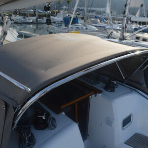 Proper frames and handrails makes it safer to move around your boat. One hand for you, one hand for the boat. Jeneau 34 Dodger- Handrails