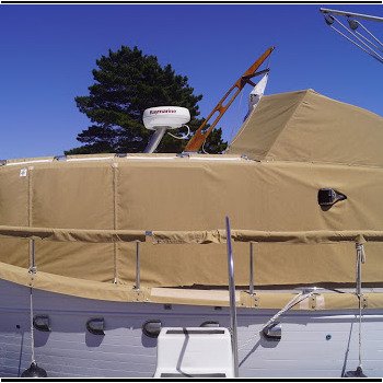 Here is the Stephens 48 after it was fitted with a custom full boat cover from Compass Canvas. Each boat is unique, so each cover must be made special for the perfect fit. Stephens 48 After Full Boat Covers