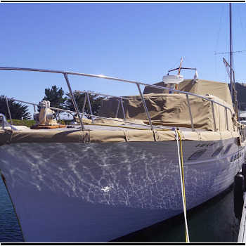 We use Solarfix thread, a teflon thread that will never rot or tear. As for fabric, we primarily use Sunbrella, WeatherMax, or Stamoid, as these have the best performance in marine environments. Stephens 48 Full Boat Cover