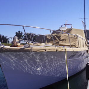 We use Solarfix thread, a teflon thread that will never rot or tear. As for fabric, we primarily use Sunbrella, WeatherMax, or Stamoid, as these have the best performance in marine environments. Stephens 48 Full Boat Cover