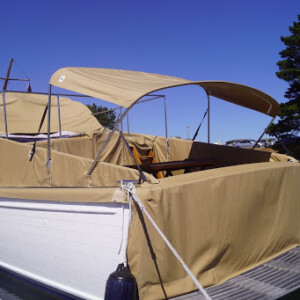This full custom boat cover gives this Stephens 48 extra protection; from the handrails, to the frame, to the back and the bimini. Stephens 48 Full Boat Covers